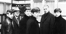 Dick James (second left) with The Beatles and George Martin